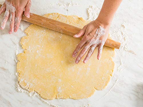 Le rouleau à pâtisserie en bois d'Ebun